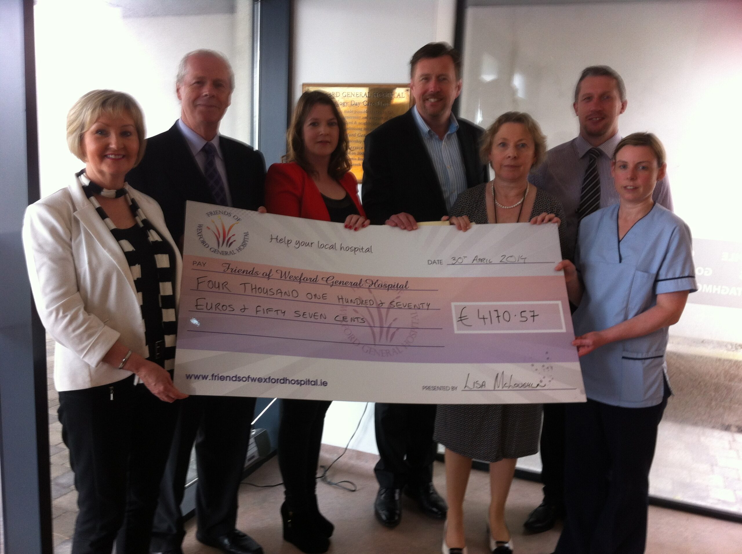 Sales of 'Our World Calendar' donation cheque presentation